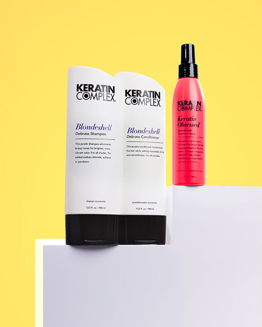 Keratin Complex blonde repair trio with debrass shampoo conditioner and treatment spray for brighter toned hair