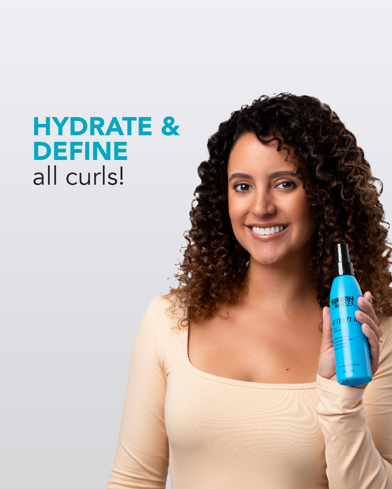 Natural curly hair enhanced with Keratin Complex KCTEXTURE for softness and bounce