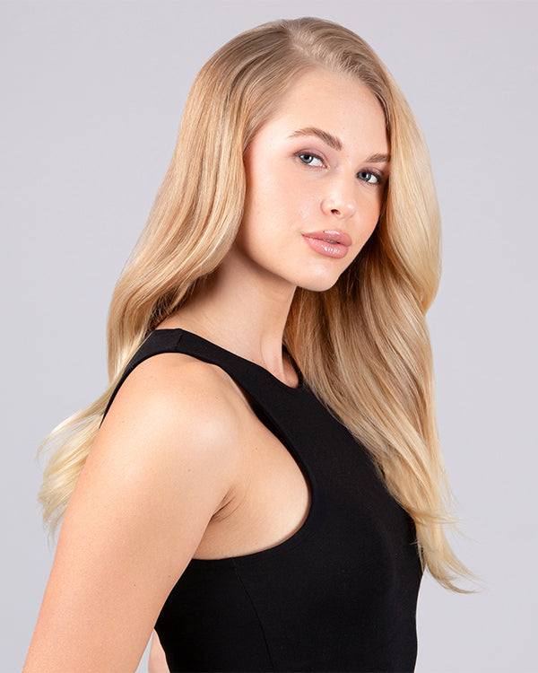 Smooth healthy blonde hair with shine after keratin blow dry