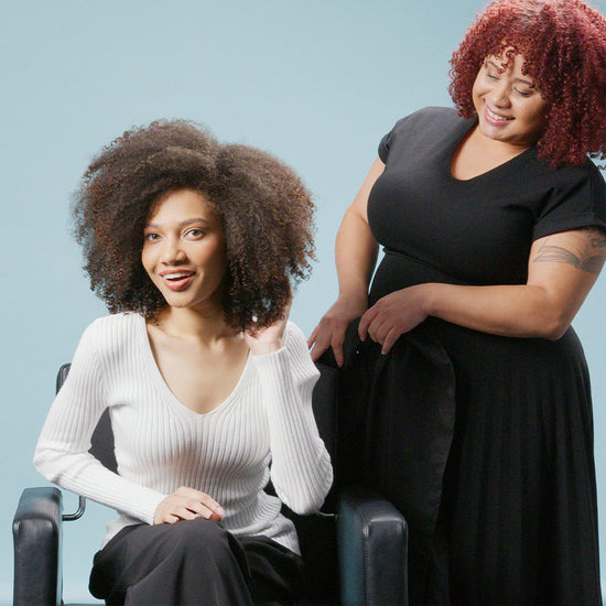 Models with natural textured hair showing healthy, defined curls
